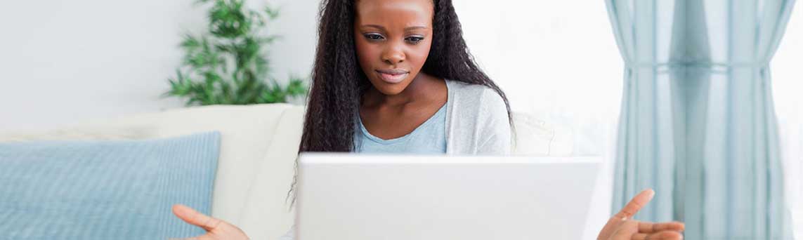 Picture of Black Womsn using a computer